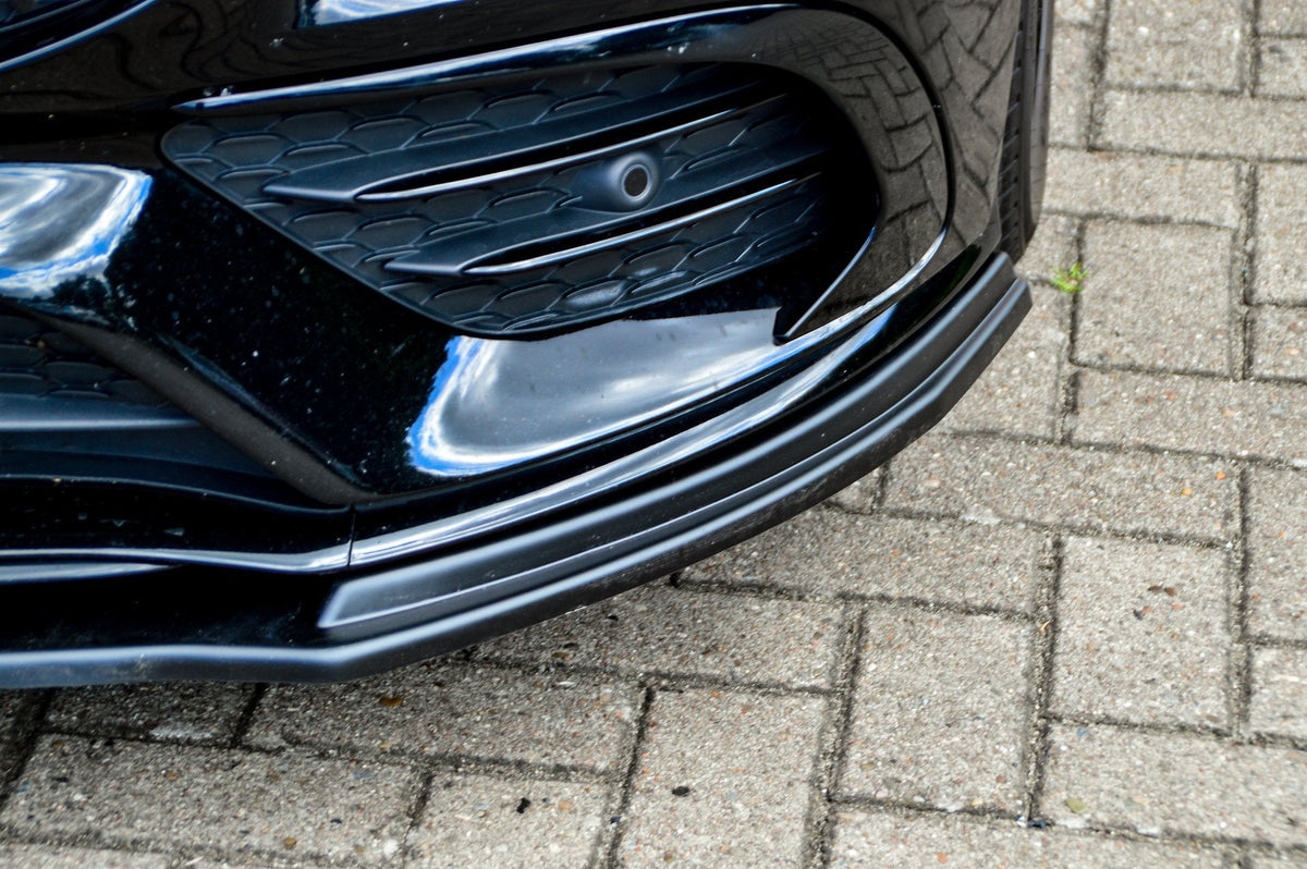 Schwarze Cuplippe Spoilerlippe aus ABS für Mercedes CLA AMG-Line C118, Ingo Noak Tuning, zeigt die sportliche Fahrzeugfront.