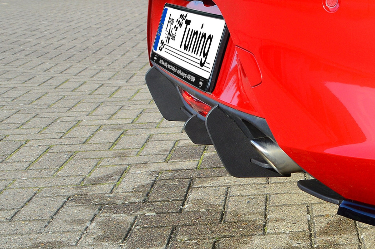 Gefräster Heckansatz mit Finnen für Opel Corsa F GS-Line von Ingo Noak Tuning, aus robustem Material, zeigt detaillierte Design.