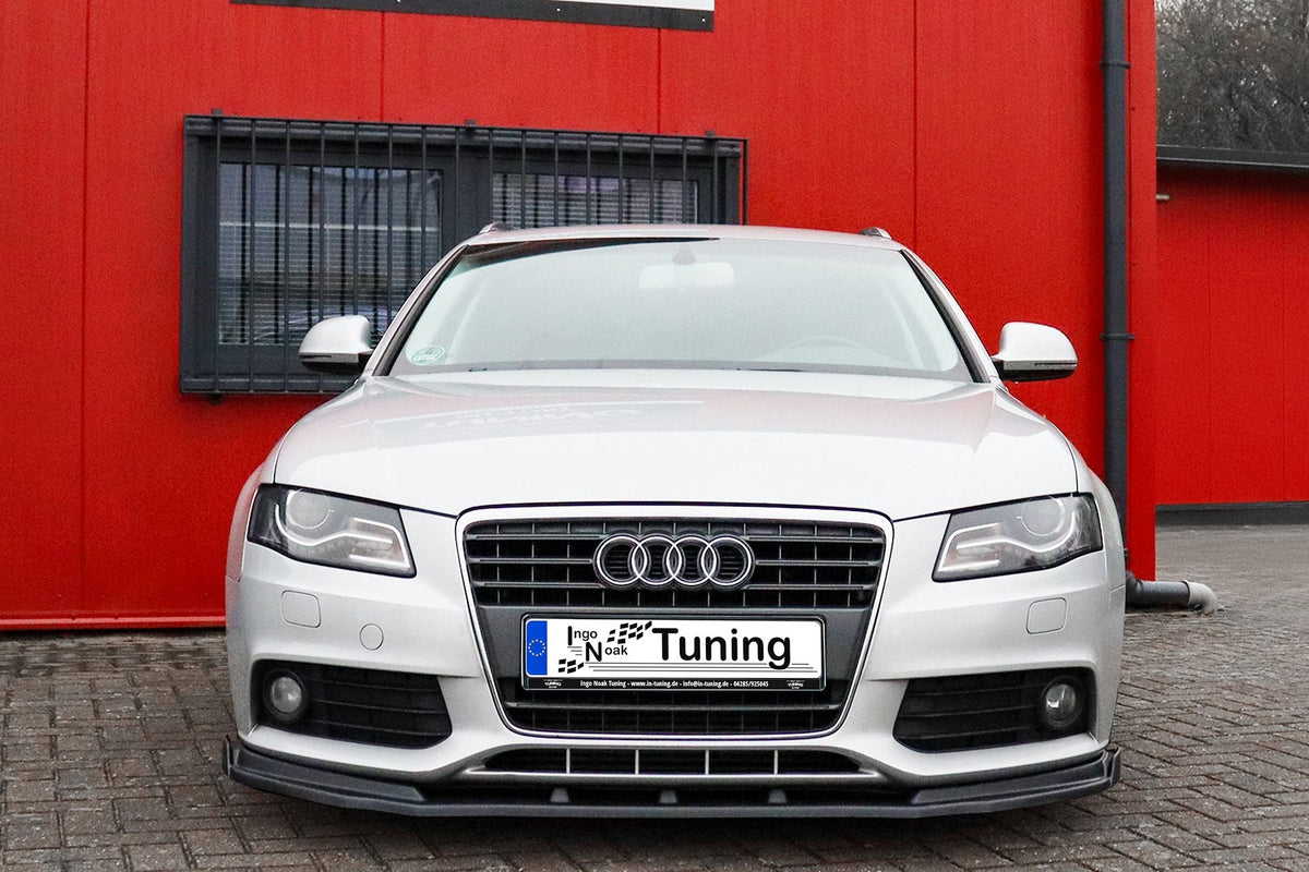 Frontspoilerlippe mit Wings für Audi A4 B8 S-Line, schwarzes Tuning-Design, sichtbar mit aerodynamischer Form und Markenbranding