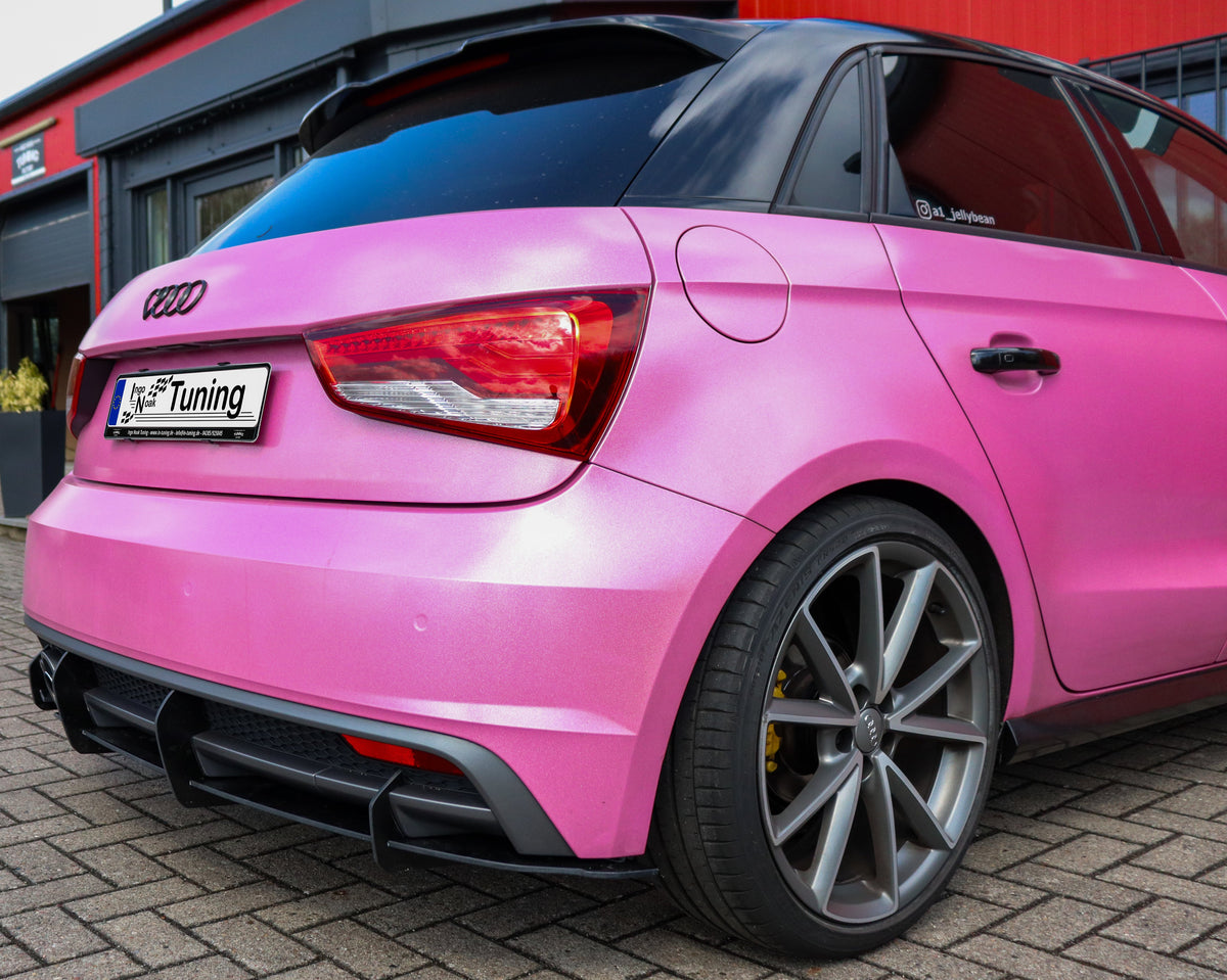 Gefräster Heckansatz für Audi A1 8X S-Line ab 2014-2018, Ingo Noak Tuning, in schwarzer Oberfläche.