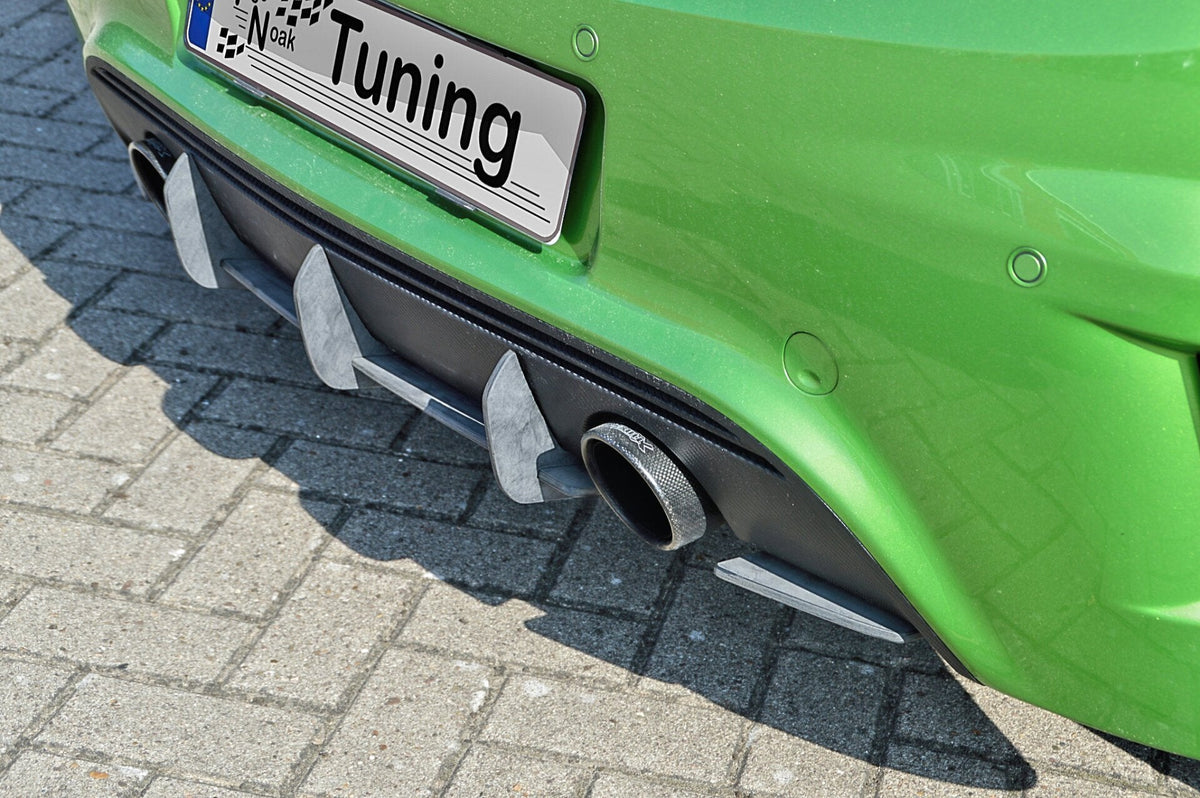 Heckansatz für Opel Corsa D OPC Nürburgring Edition, Ingo Noak Tuning, aus schwarzem Kunststoff, sichtbare Befestigungspunkte.